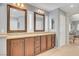 Double vanity bathroom with granite countertops and plenty of cabinet space at 8217 Quail Arroyo Ave, Las Vegas, NV 89131