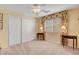 Well-lit bedroom with double closets and neutral decor at 8217 Quail Arroyo Ave, Las Vegas, NV 89131