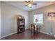 Cozy bedroom with a desk and built-in shelving at 9113 Sea Mink Ave, Las Vegas, NV 89149