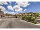 Gated community entrance with landscaping at 12 Lomita Heights Dr, Las Vegas, NV 89138