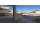 Front yard view of a home with a paved walkway, landscaping, and a covered porch at 1730 Jerome Ln, Pahrump, NV 89048