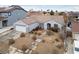 Single-story home with two-car garage and landscaped yard at 186 Regal Sunset Ave, Henderson, NV 89002