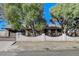 Single-story house with gated entrance and mature landscaping at 2381 Marion St, Las Vegas, NV 89104