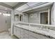 Elegant bathroom with double vanity and granite countertop at 2848 Cape Verde Ln, Las Vegas, NV 89128