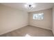 Bedroom featuring plush carpeting, ample natural light, and closet space at 4364 El Campana Way, Las Vegas, NV 89121