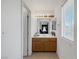 Light and bright bathroom with wooden vanity at 5081 Pine Mountain Ave, Las Vegas, NV 89139