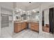 Spacious Primary bathroom with corner vanity and double sinks at 65 Clayton St, Las Vegas, NV 89110