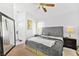 Main bedroom with a ceiling fan and mirrored closet doors at 6653 Lund Dr, Las Vegas, NV 89108