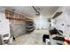 Garage with shelving, pegboard, and workbench at 7309 Raincloud Dr, Las Vegas, NV 89145