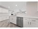 Bright kitchen featuring white shaker cabinets, stainless steel appliances, and an island at 9017 Meisenheimer Ave, Las Vegas, NV 89143