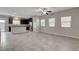 Open living area with tile flooring and a ceiling fan at 9162 Sea Mink Ave, Las Vegas, NV 89149