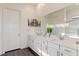 Bathroom with double vanity and frameless shower at 924 Mayfield Manor Ln, Las Vegas, NV 89138