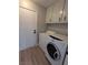 Laundry room with washer, dryer, and storage at , Las Vegas, NV 89103