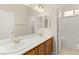 Double sink vanity in bathroom with separate bathtub/shower at 10823 Meadow Garden Ct, Las Vegas, NV 89135