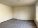 Simple bedroom with carpeted flooring and window at 1565 Pasture Ln, Las Vegas, NV 89110