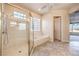 Spa-like bathroom featuring a walk-in shower and soaking tub at 1964 Oliver Springs St, Henderson, NV 89052