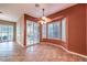 Spacious dining area with tile floors, sliding glass doors, and a view at 1964 Oliver Springs St, Henderson, NV 89052