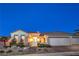 Stunning desert home with three-car garage, mature landscaping, and brick paver driveway at 1964 Oliver Springs St, Henderson, NV 89052