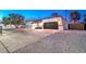 Front view of the house with a driveway and garage at 2500 W Oakey Blvd, Las Vegas, NV 89102