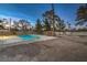 Refreshing backyard swimming pool with surrounding landscaping at 2500 W Oakey Blvd, Las Vegas, NV 89102