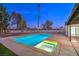 L-shaped pool with built-in spa at 2500 W Oakey Blvd, Las Vegas, NV 89102