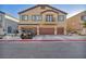 Two-story home with double garage and curb appeal at 4645 Ridgeley Ave # 103, North Las Vegas, NV 89084