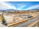 Aerial view of property with mobile home and several outbuildings at 4901 Maple Rd, Pahrump, NV 89048