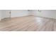 Empty living room with wood-look flooring at 5731 Hazen Ct, Las Vegas, NV 89110