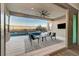 Inviting backyard oasis featuring a sparkling pool, spa, and covered patio at 6800 Equinox Cliff St, Las Vegas, NV 89135