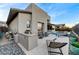 Spacious backyard with pool, spa, and outdoor kitchen at 6800 Equinox Cliff St, Las Vegas, NV 89135