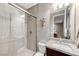 Modern bathroom with a walk-in shower and vanity at 6800 Equinox Cliff St, Las Vegas, NV 89135