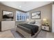 Virtually staged bedroom with neutral tones and decor at 6800 Equinox Cliff St, Las Vegas, NV 89135