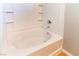 Clean bathtub with tiled surround at 8777 W Maule Ave # 2127, Las Vegas, NV 89148