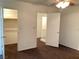 Bedroom with walk-in closet and access to loft area at 10443 Lilac Tree Ave, Las Vegas, NV 89135