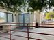 Backyard patio with concrete surface and double doors leading to another room at 127 Coventry Cir, Henderson, NV 89074