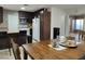 Kitchen with dark wood cabinets and a double sink at 1817 Amboy Dr, Las Vegas, NV 89108