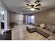 Living room with L-shaped sofa and view of staircase at 1817 Amboy Dr, Las Vegas, NV 89108