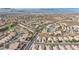 Aerial view of the neighborhood with single-Gathering homes and open streets at 2591 Binary Stars St, Henderson, NV 89044