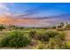 Scenic golf course view with a beautiful sunset backdrop at 4541 Largo Cantata St, Las Vegas, NV 89135