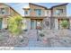 Two-story modern home with landscaped front yard and stone pathway at 542 Celebratory Pl, Henderson, NV 89011