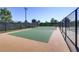 Well-maintained tennis court with a green surface at 542 Celebratory Pl, Henderson, NV 89011