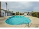 Community swimming pool with a covered patio area at 5870 Medallion Dr # 103, Las Vegas, NV 89122