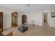 Living room with tile flooring and a grandfather clock at 5975 Via Capri, Las Vegas, NV 89122