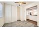 Bedroom with closet, carpet and kitchen view at 708 Orchid Tree Ln, Henderson, NV 89011