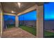 Covered patio with brick pavers and view of the sunset at 10825 Space Odyssey Ave, Las Vegas, NV 89129