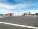 Exterior view of a school building with a parking area and palm trees at 2132 Fred Brown Dr, Las Vegas, NV 89106