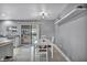 Modern dining area adjacent to the kitchen with access to backyard at 2936 Brady Ave, Las Vegas, NV 89101