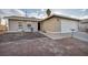 Single-story home with attached garage, front yard landscaping, and a driveway at 2936 Brady Ave, Las Vegas, NV 89101