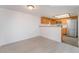 Dining area adjacent to the kitchen with wood-look tile flooring at 3450 Erva St # 165, Las Vegas, NV 89117