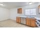 Bright kitchen features stainless steel appliances and wood cabinets at 3937 Jackpot Cir, Las Vegas, NV 89110